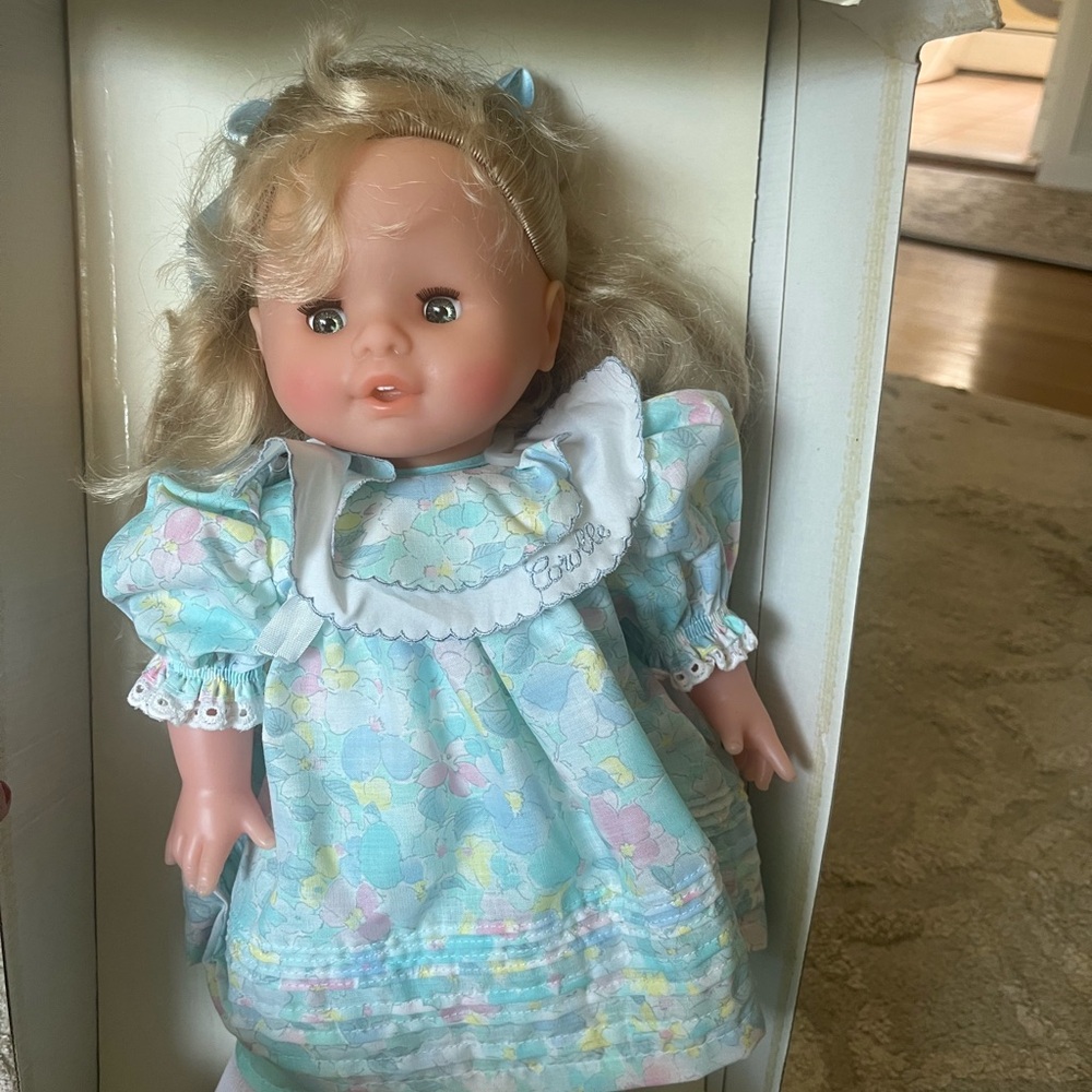 Adorable Blonde Doll with Blue Dress